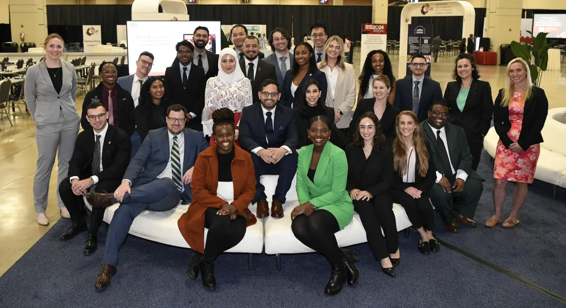 Diverse group of trainees and young professionals seated in The Hub